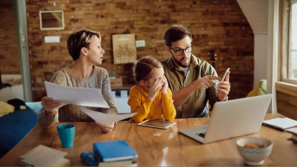 Family reviewing financial documents